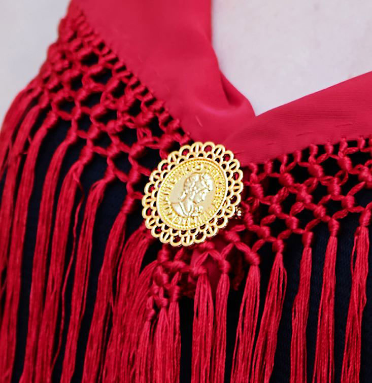 Broches de Flamenca. Moneda con Filigrana